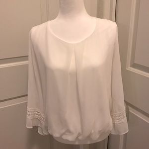 White flowing blouse